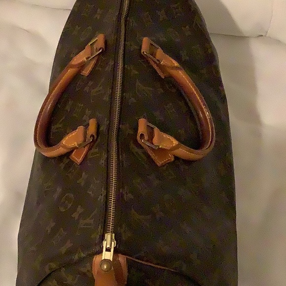 Louis Vuitton Brown Duffel Bag with Iconic Monogram and Leather Trim - Picture 5 of 16